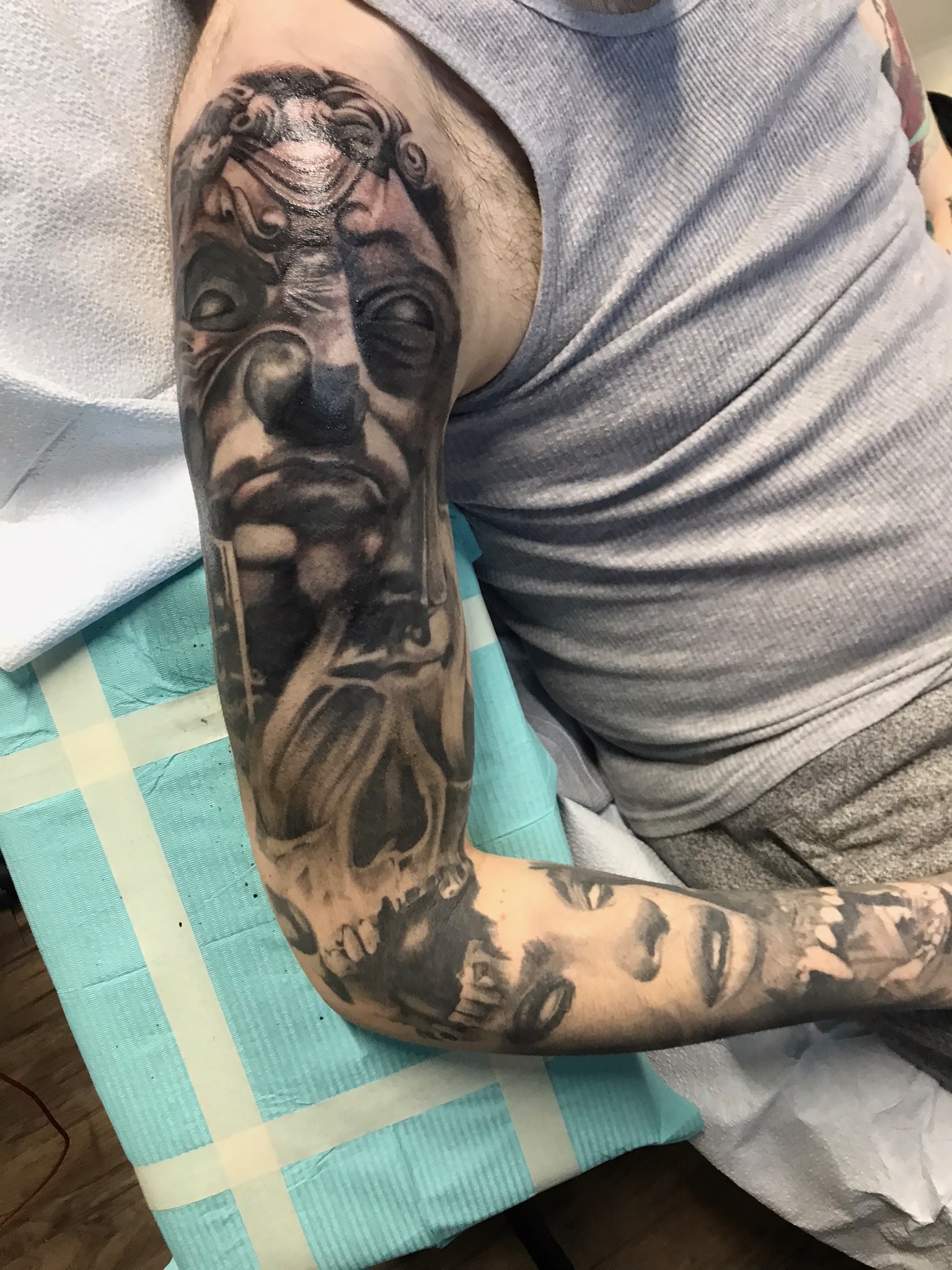 Black and grey sleeve tattoo