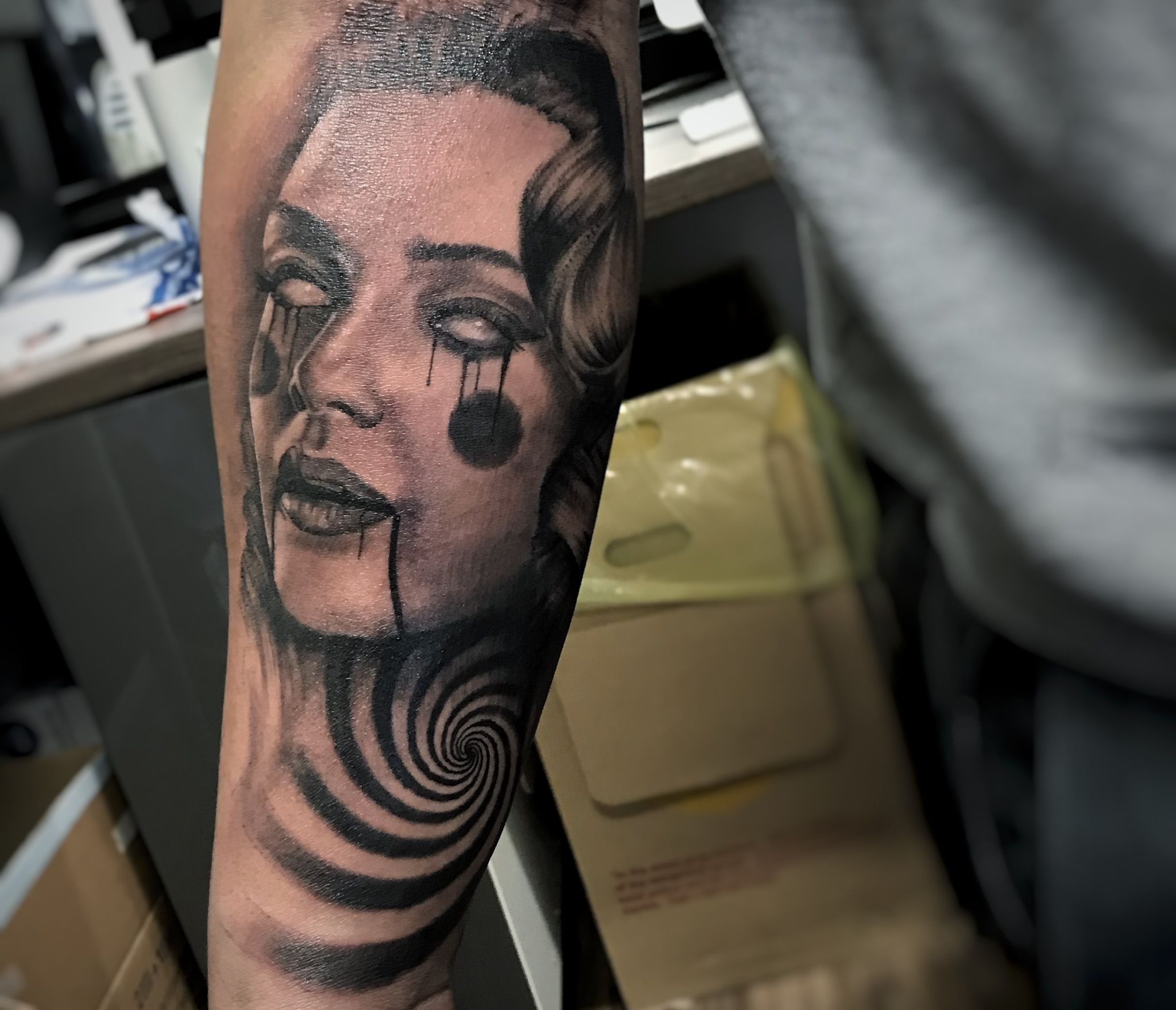 Demon girl with spiral tattoo