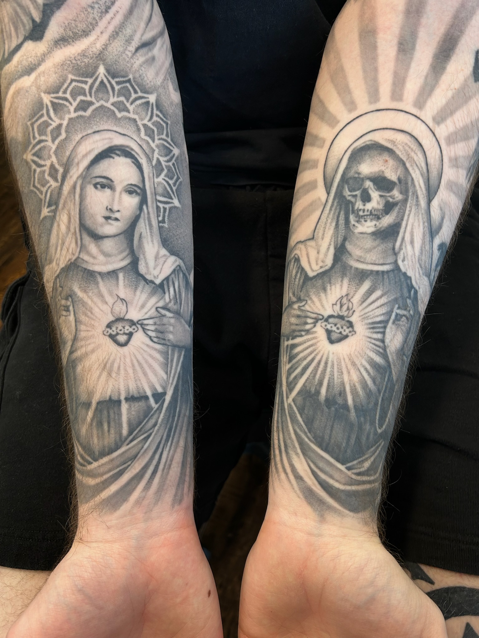 Black and grey sleeve tattoo