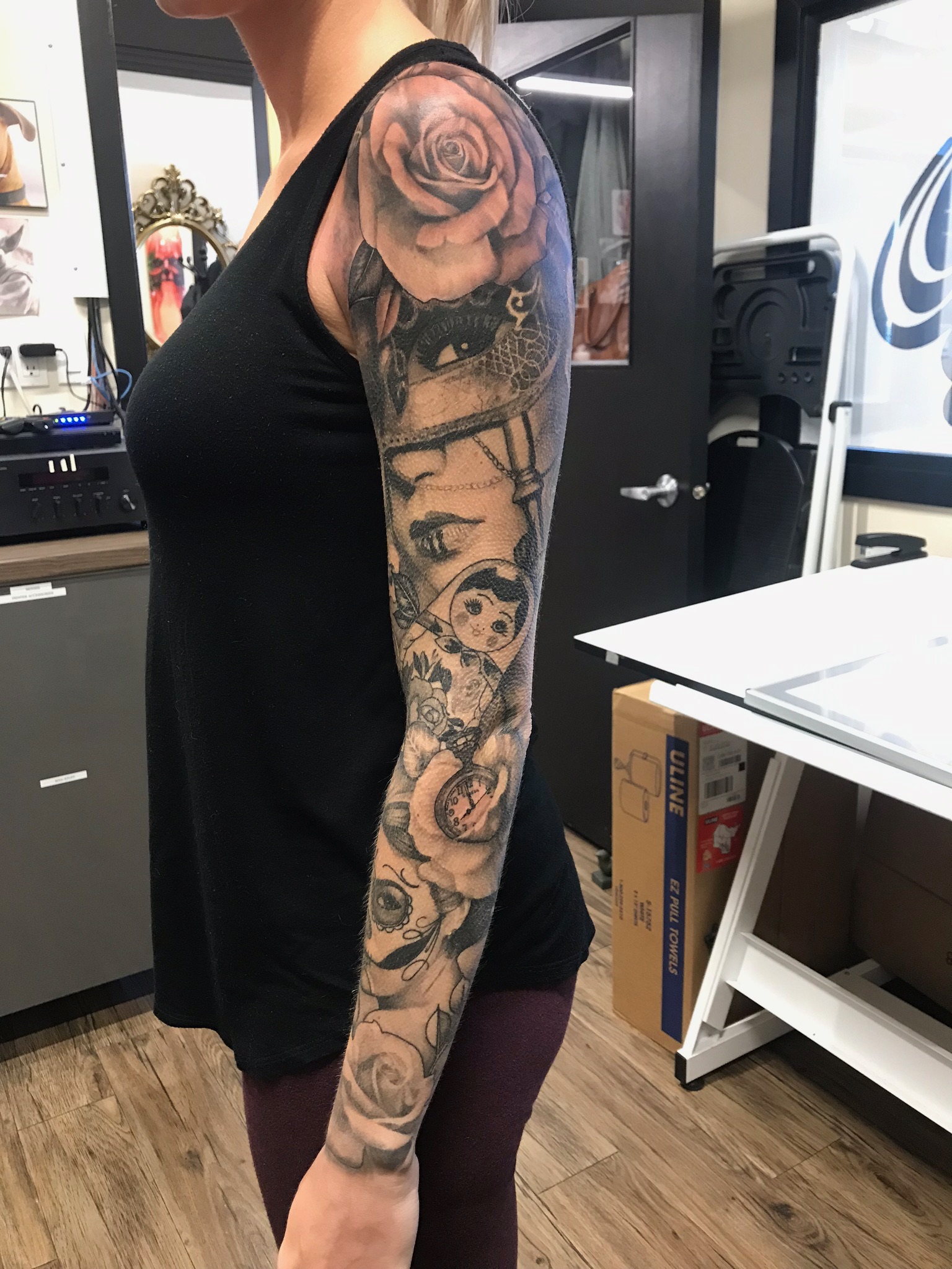 Girl and Russian doll sleeve tattoo