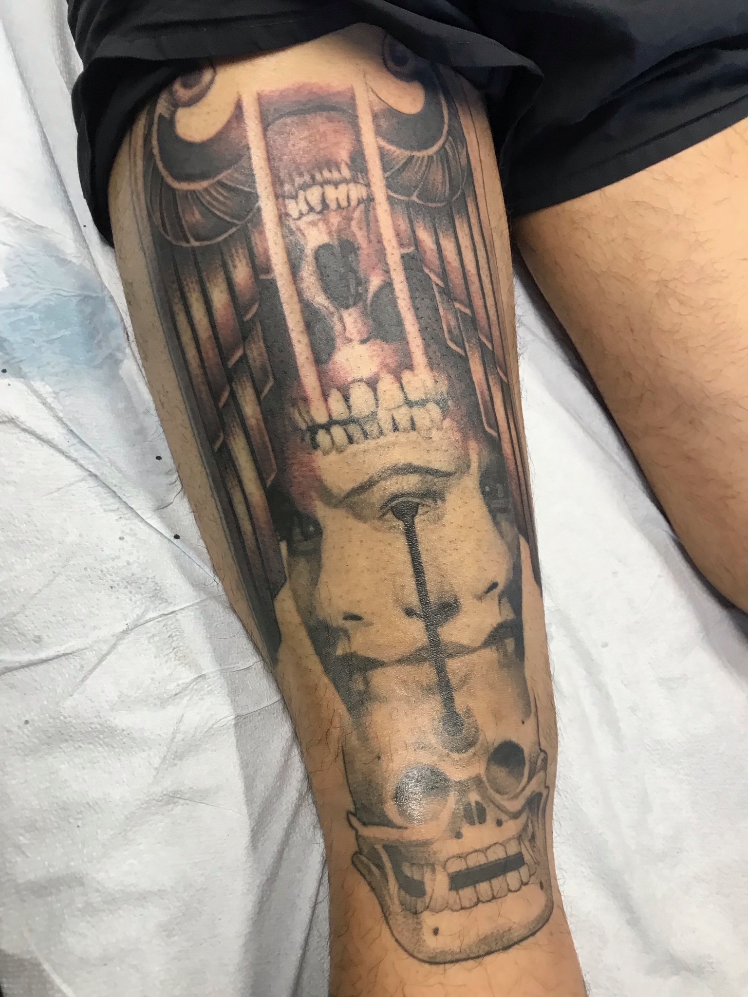 Black and grey sleeve tattoo