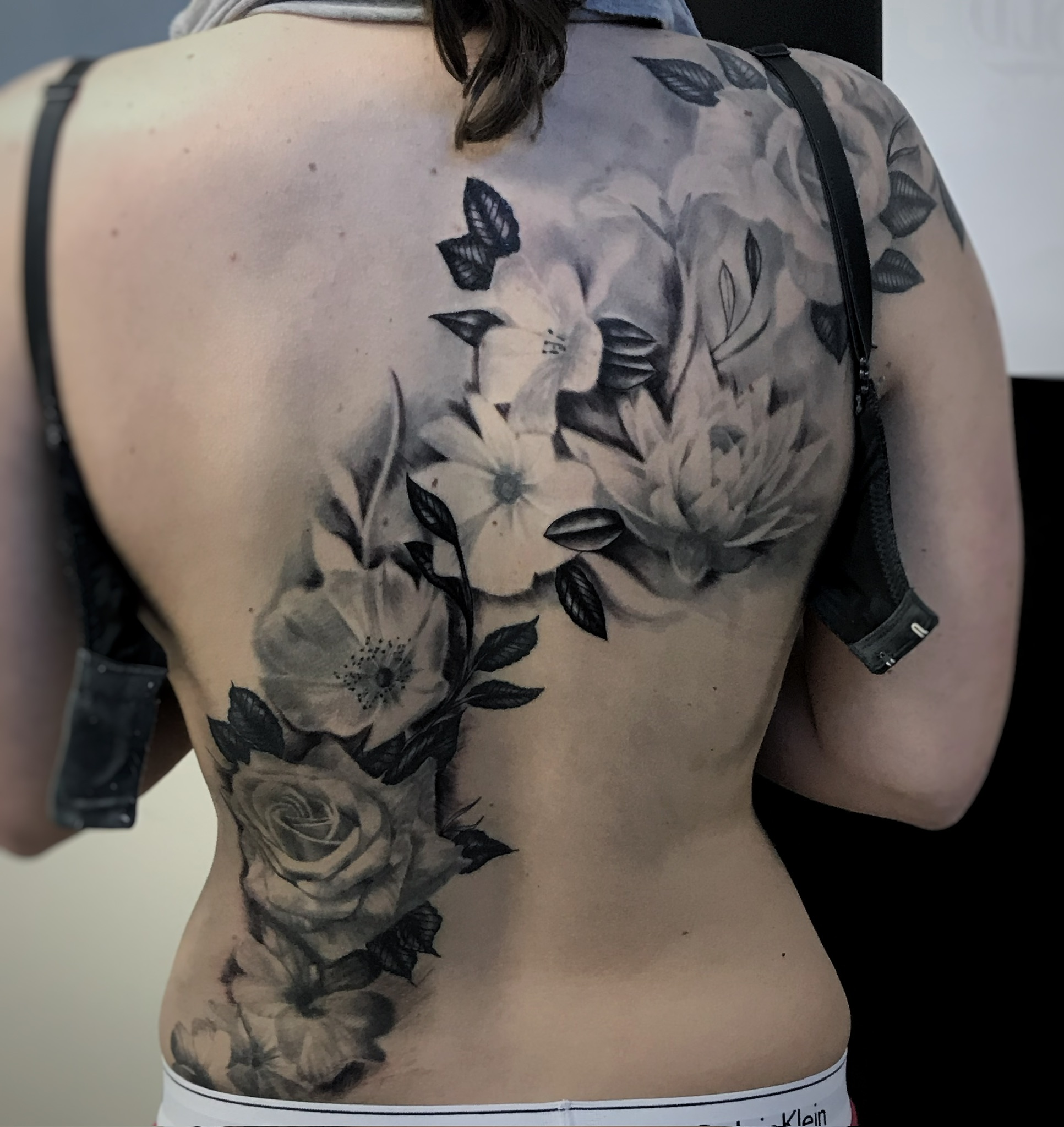 Flower back tattoo