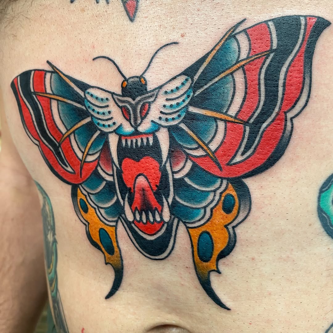 Colour moth tattoo by Marshall