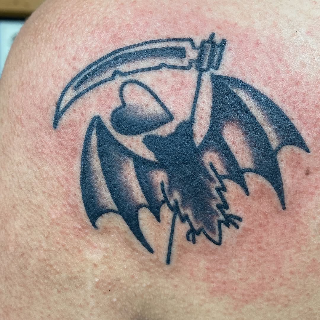 Black winged grim reaper with a scythe by Marshall