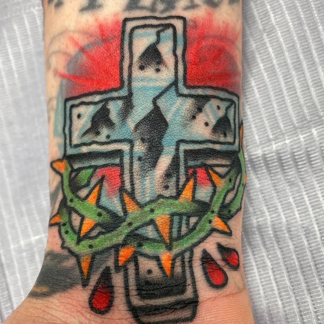 Traditional cross tattoo by Marshall
