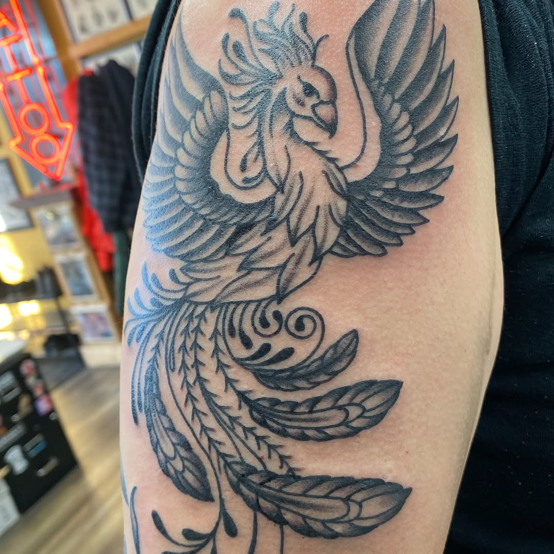 Black and grey phoenix tattoo by Marshall