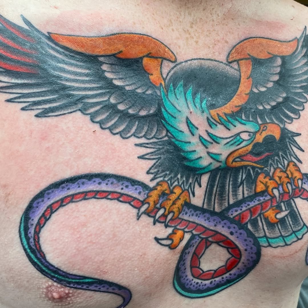 Eagle and snake chest tattoo by Marshall