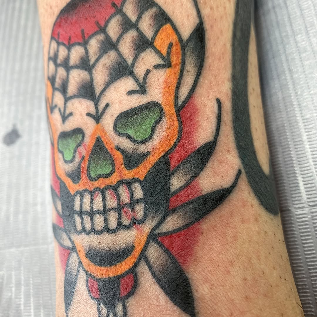 Colour skull and spiderweb tattoo by Marshall