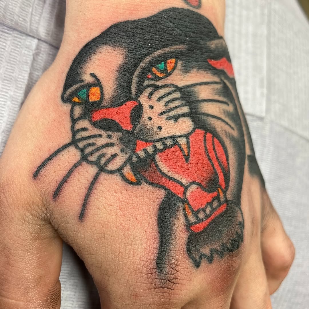 Black traditional cat tattoo by Marshall